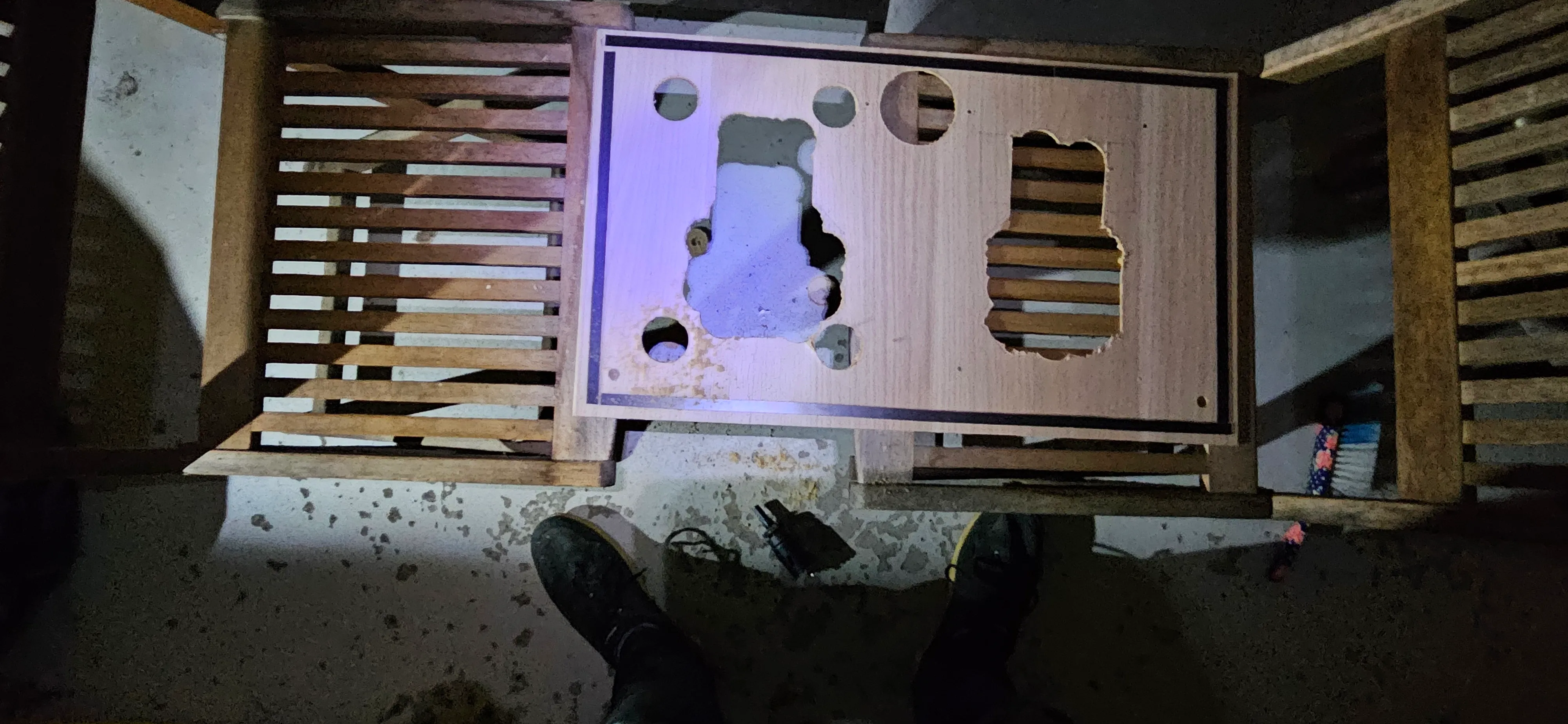 Sawing and drilling the cabinet to make ventilation openings