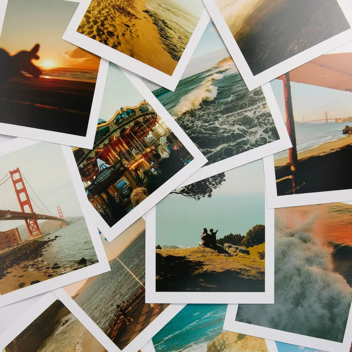 A selection of printed photographs with white borders.