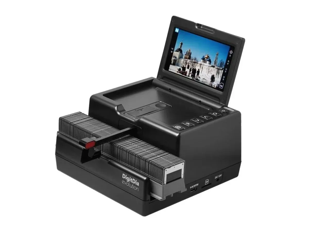 A slide scanner with a loaded magazine and a preview screen.